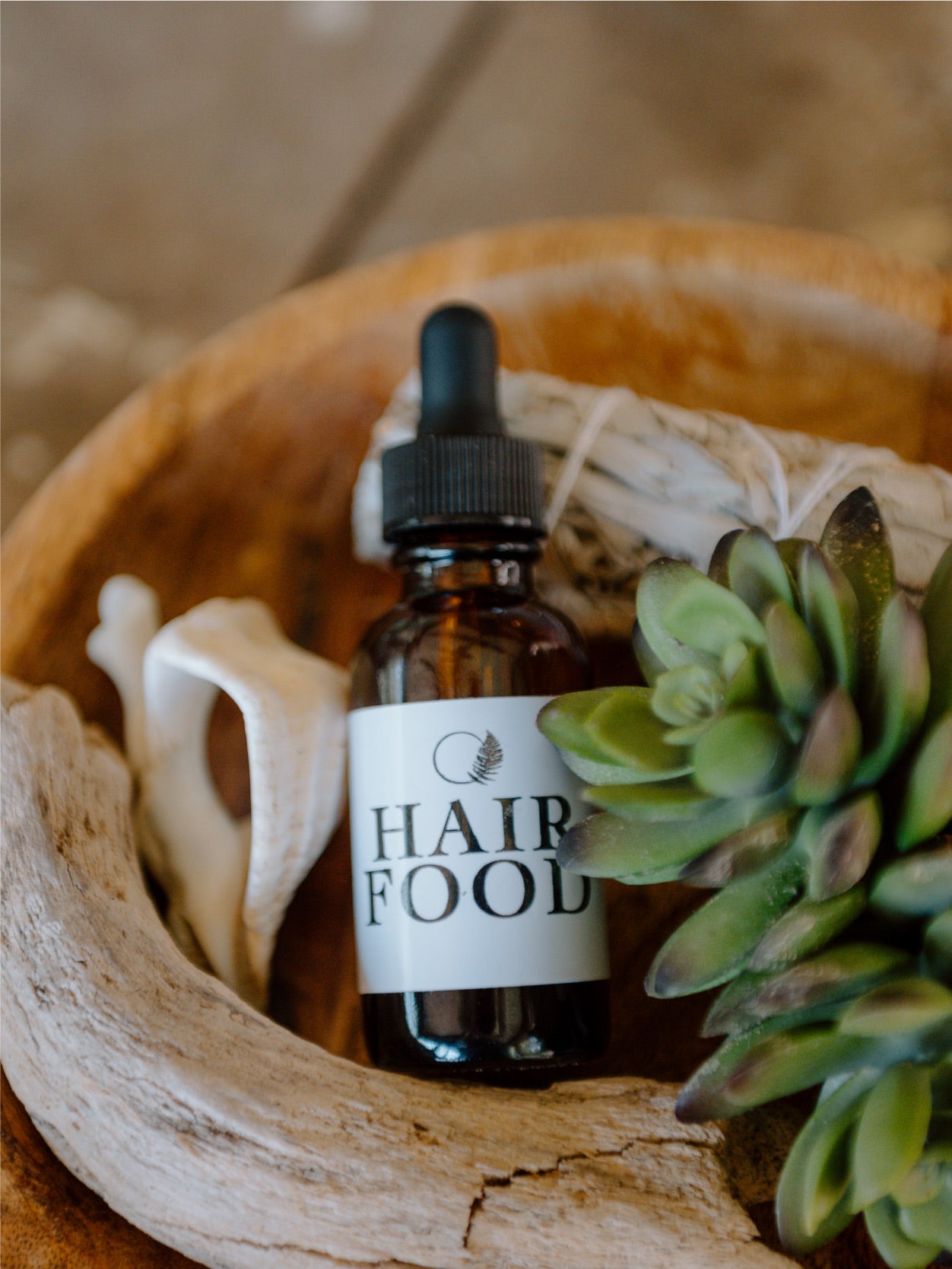 Ayurvedic Hair Food oil packaged in a 1-ounce glass dropper bottle, made with organic herbal ingredients