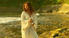 video clips of women playing by beach and laughing